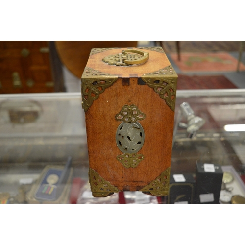 865 - A Chinese miniature table cabinet with inset hard stone panels.