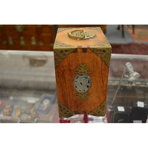 865 - A Chinese miniature table cabinet with inset hard stone panels.