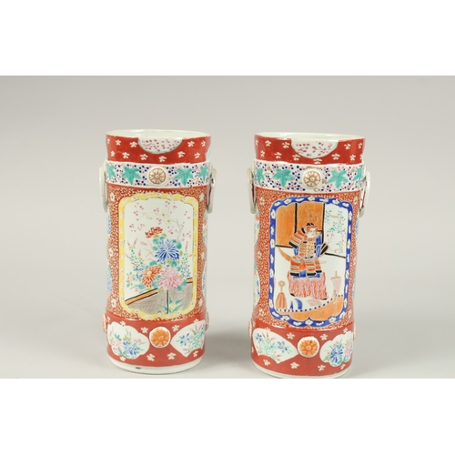 134 - A PAIR OF JAPANESE IMARI CIRCULAR VASES. 26cms high.