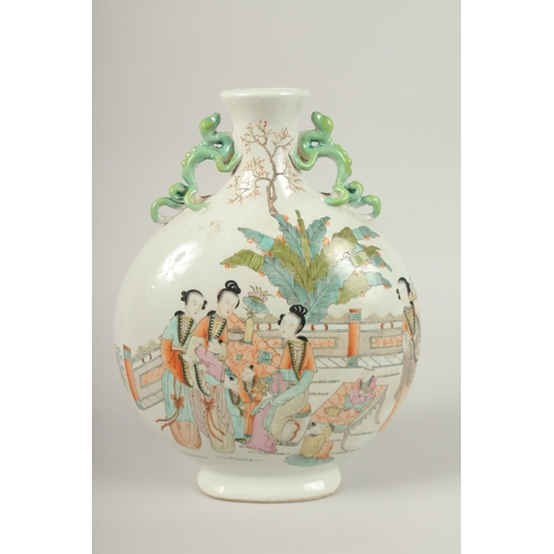 135 - A CHINESE PORCELAIN MOON FLASK painted with figures. 33cms high.