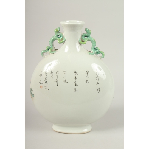 135 - A CHINESE PORCELAIN MOON FLASK painted with figures. 33cms high.