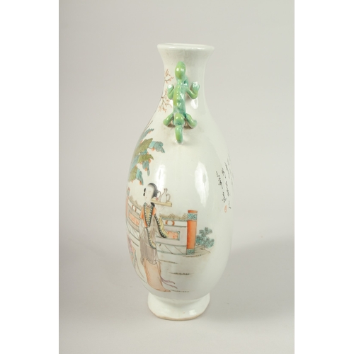 135 - A CHINESE PORCELAIN MOON FLASK painted with figures. 33cms high.