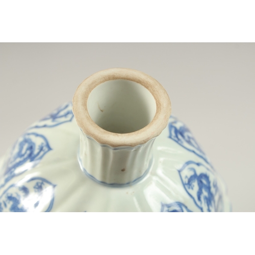 143 - A CHINESE BLUE AND WHITE DRAGON STEM CUP. 17cms diameter.