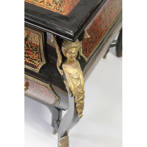 15 - A VERY LARGE LOUIS XIV STYLE DESK after a model by ANDRE-CHARLES BOULLE with brasss inlay on red tor... 