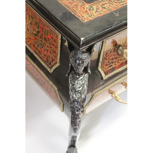 15 - A VERY LARGE LOUIS XIV STYLE DESK after a model by ANDRE-CHARLES BOULLE with brasss inlay on red tor... 