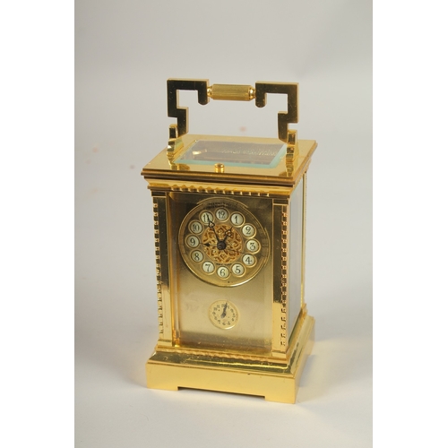 161 - A GOOD GILT BRONZE REPEATING CARRIAGE CLOCK with alarm. 14cms high.