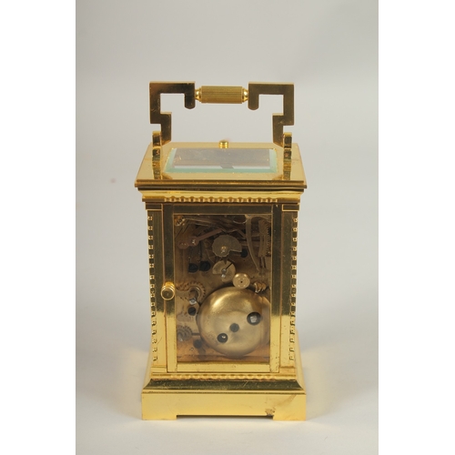 161 - A GOOD GILT BRONZE REPEATING CARRIAGE CLOCK with alarm. 14cms high.