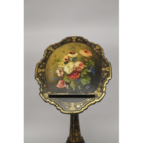 2 - A GOOD VICTORIAN PAPIER MACHE WRITING STAND, edged in gilt and painted with flowers on a ring stem, ... 