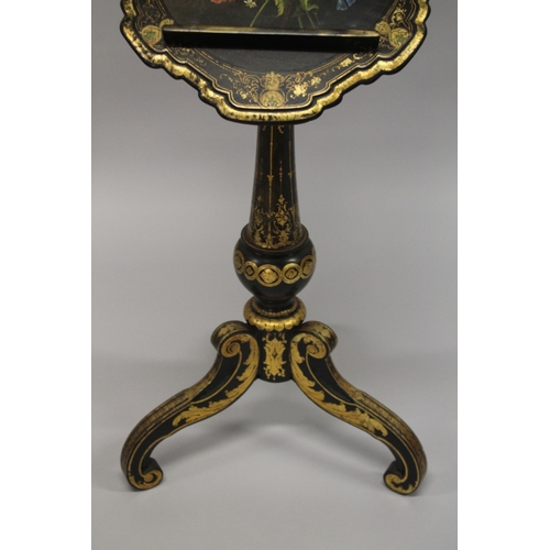 2 - A GOOD VICTORIAN PAPIER MACHE WRITING STAND, edged in gilt and painted with flowers on a ring stem, ... 