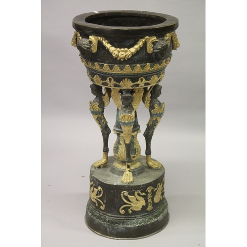 20 - A LOUIS XVITH DESIGN BRONZE GILDED CIRCULAR VASE with masks and garlands (weathered). 114cm high.... 