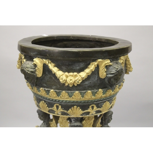 20 - A LOUIS XVITH DESIGN BRONZE GILDED CIRCULAR VASE with masks and garlands (weathered). 114cm high.... 