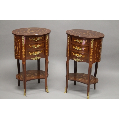 27 - A PAIR OF FRENCH STYLE MAHOGANY AND MARQUETRY OVAL SHAPE FOUR-DRAWER BEDSIDE CHESTS with an under ti... 