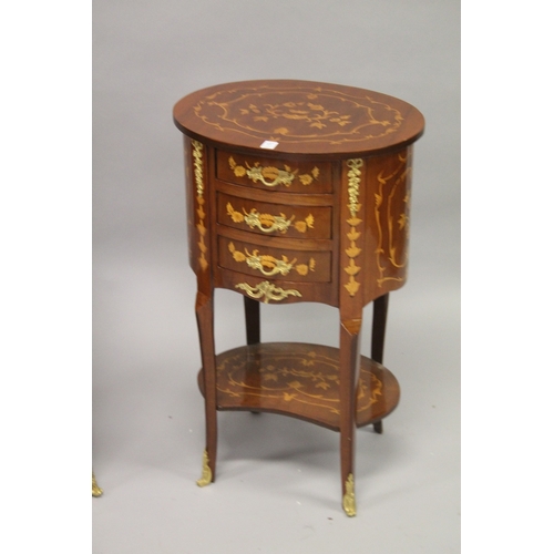 27 - A PAIR OF FRENCH STYLE MAHOGANY AND MARQUETRY OVAL SHAPE FOUR-DRAWER BEDSIDE CHESTS with an under ti... 