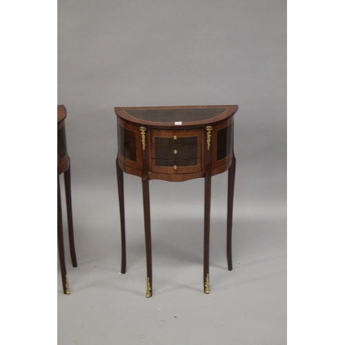 28 - A PAIR OF FRENCH STYLE MAHOGANY AND MARQUETRY DEMI-LUNE THREE-DRAWER BEDSIDE CHESTS. 67cms high x 46... 