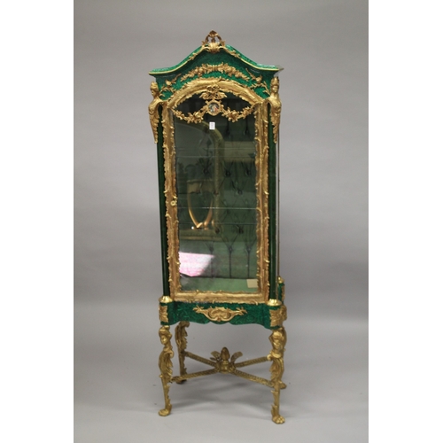 33 - AN UNUSUAL FAUX MALACHITE AND ORMOLU MOUNTED VITRINE, with a single door enclosing two glass shelves... 