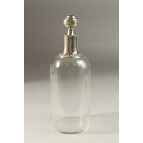 50 - A GOOD CONTINENTAL GLASS DECANTER. engraved CR in a shell, with silver mount and stopper. 28cms high... 