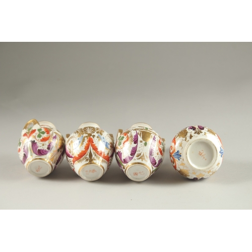 62 - A GARNITURE OF FOUR SMALL PIECES OF CROWN DERBY, scent bottle & stopper and three small vases. Mark ... 