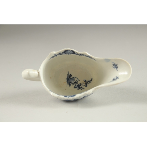 67 - A SMALL LOWESTOFT BLUE AND WHITE SAUCEBOAT. Circa. 1771.  11cms.