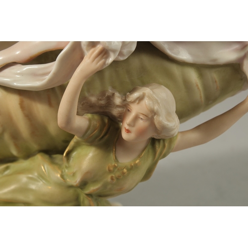 74 - A ROYAL DUX PORCELAIN SHAPED BOWL held by a young lady. 17cms high. Triangle mark No. 1117.