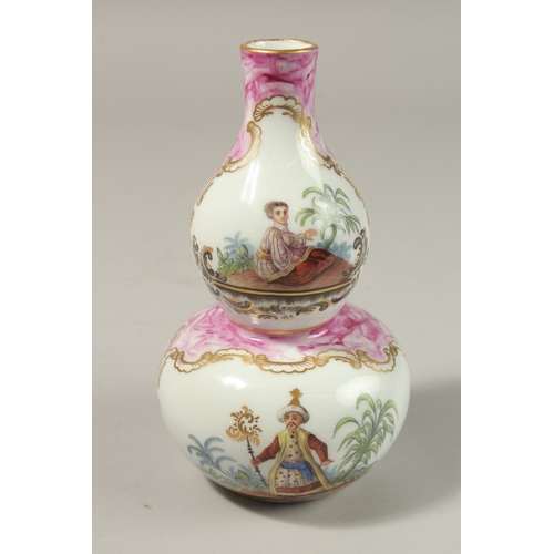 78 - A GOOD FRENCH PORCELAIN DOUBLE GOURD VASE painted with Turkish scenes and flowers. 20cms high.