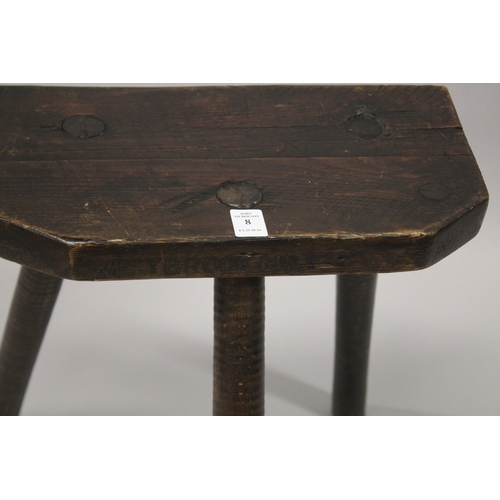 8 - A CUTLERS WOODEN THREE LEGGED STOOL stamped 