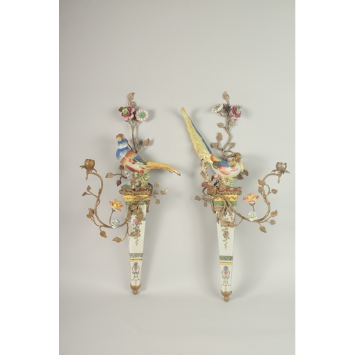 86 - A GOOD PAIR OF GILT METAL AND PORCELAIN PHEASANTS WALL SCONCES with two candle sconces, flowers and ... 