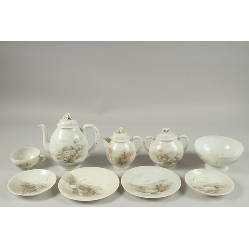 1006 - A JAPANESE VINTAGE PORCELAIN TEA SET, each piece painted with landscape scenes and inscriptions, (qt... 