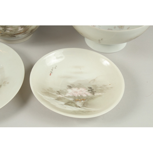 1006 - A JAPANESE VINTAGE PORCELAIN TEA SET, each piece painted with landscape scenes and inscriptions, (qt... 