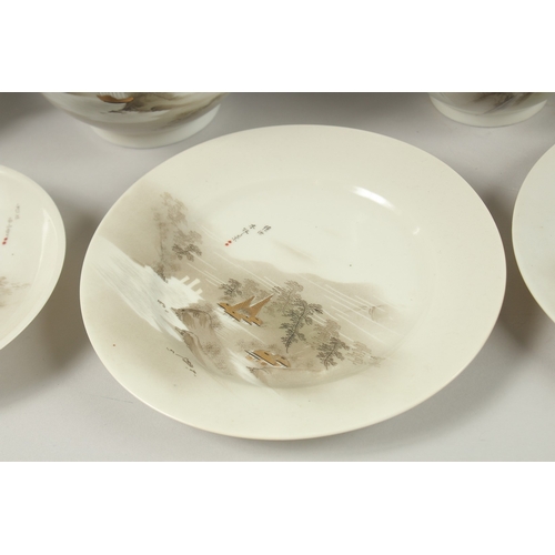 1006 - A JAPANESE VINTAGE PORCELAIN TEA SET, each piece painted with landscape scenes and inscriptions, (qt... 