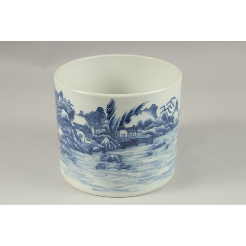 1013 - A LARGE CHINESE BLUE AND WHITE PORCELAIN CYLINDRICAL BRUSH POT, painted with a continuous landscape ... 