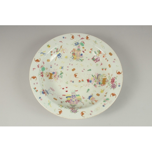 1021 - A CHINESE POLYCHROME PORCELAIN PLATE, painted with colourful enamels depicting precious objects, pea... 