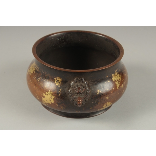 1022 - A CHINESE GOLD SPLASH BRONZE TWIN HANDLE CENSER, the base with character mark, 19cm wide handle to h... 