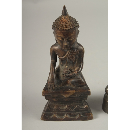 1027 - TWO CHINESE BRONZE BUDDHAS, 17cm and 19cm high.