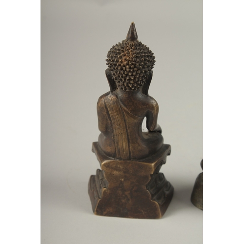 1027 - TWO CHINESE BRONZE BUDDHAS, 17cm and 19cm high.