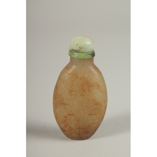 1029 - A CHINESE CARVED JADE SCENE BOTTLE, with calligraphy, 6.5cm high.