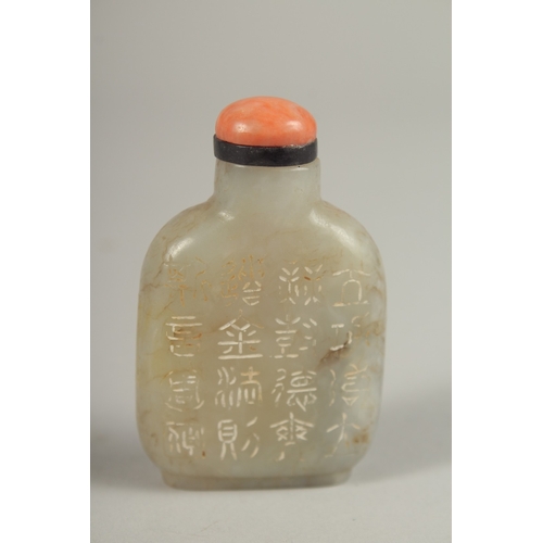 1030 - A CHINESE CARVED JADE SCENT BOTTLE, with calligraphy in the form of poem, 6.5cm high.