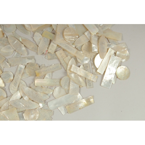 1036 - A LARGE QUANTITY OF CHINESE CARVED MOTHER OF PEARL COUNTERS, various forms and sizes, (qty).