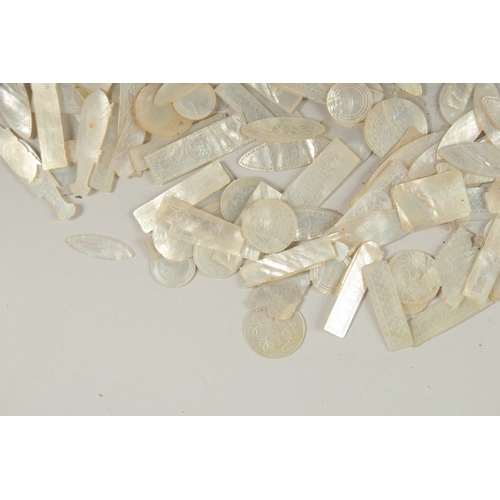 1036 - A LARGE QUANTITY OF CHINESE CARVED MOTHER OF PEARL COUNTERS, various forms and sizes, (qty).