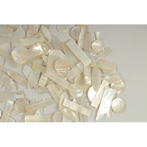 1036 - A LARGE QUANTITY OF CHINESE CARVED MOTHER OF PEARL COUNTERS, various forms and sizes, (qty).