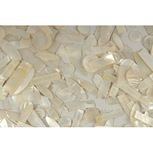 1036 - A LARGE QUANTITY OF CHINESE CARVED MOTHER OF PEARL COUNTERS, various forms and sizes, (qty).