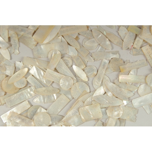 1036 - A LARGE QUANTITY OF CHINESE CARVED MOTHER OF PEARL COUNTERS, various forms and sizes, (qty).