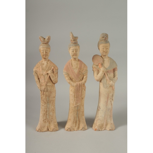 1041 - THREE TANG POTTERY TOMB FIGURES, tallest 41cm high.