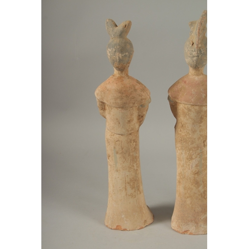 1041 - THREE TANG POTTERY TOMB FIGURES, tallest 41cm high.