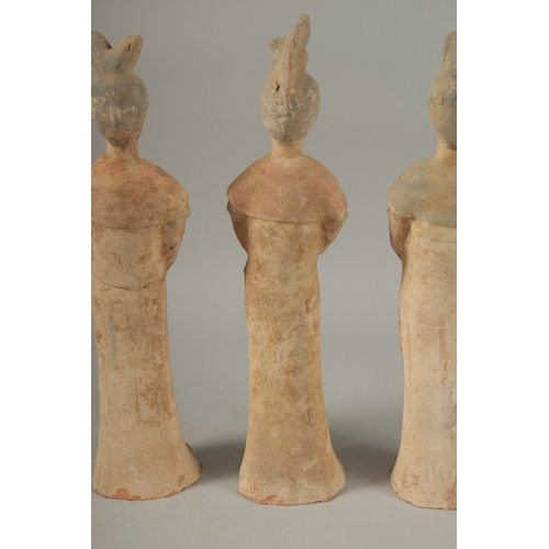 1041 - THREE TANG POTTERY TOMB FIGURES, tallest 41cm high.