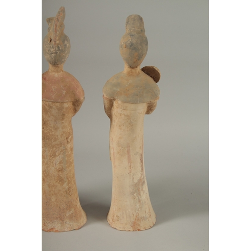 1041 - THREE TANG POTTERY TOMB FIGURES, tallest 41cm high.