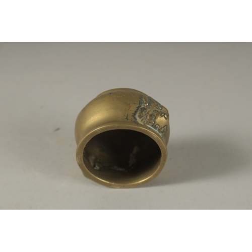 1048 - A MINIATURE 18TH CENTURY BRONZE CENSER, with lion ring handles, 5cm diameter.