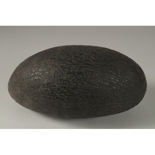 1049 - A SUPERB EXTENSIVELY CARVED COCO DE MER, with Islamic calligraphy, 30cm long, 14cm wide, 11cm deep.