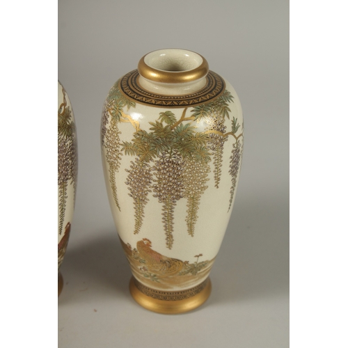 1062 - A VERY FINE PAIR OF JAPANESE SATUSMA VASES, painted with hens and flora with fine gilt highlights, s... 