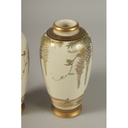 1062 - A VERY FINE PAIR OF JAPANESE SATUSMA VASES, painted with hens and flora with fine gilt highlights, s... 