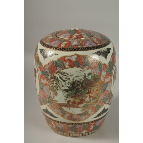 1063 - A LARGE JAPANESE SATSUMA JAR AND COVER, painted with panels of figures and landscape scenes with gil... 